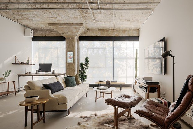 Loft industrial com tijolos expostos